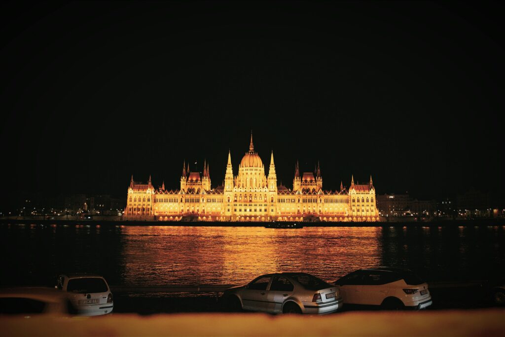 pexels-photo-16001648-16001648 Stunning nighttime view of the illuminated Hungarian Parliament Building in Budapest, Hungary.